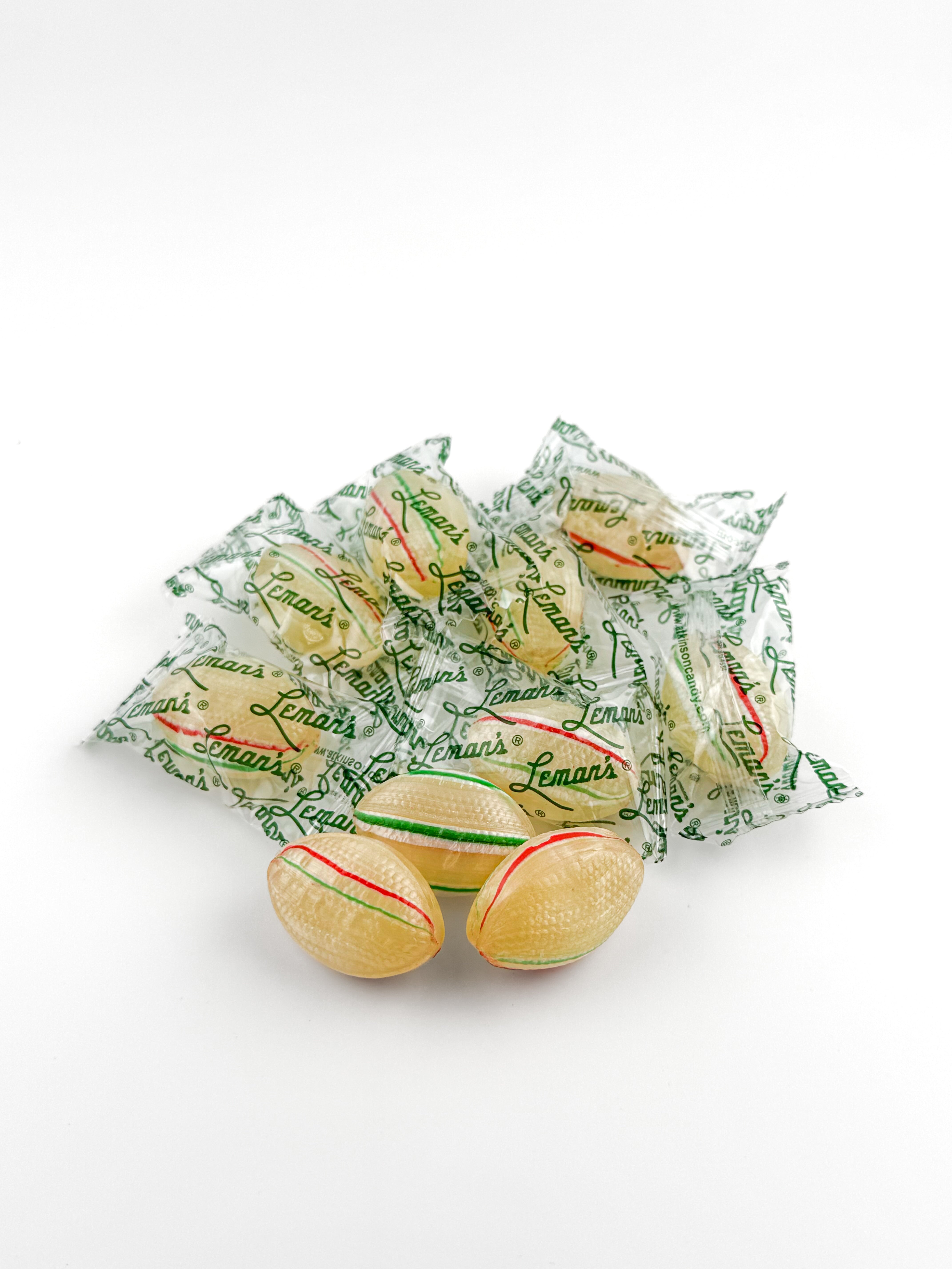 イマン　アルメット缶 Leman's® Mint Footballs - Bulk (15 lb Case) – Atkinson Candy Co.